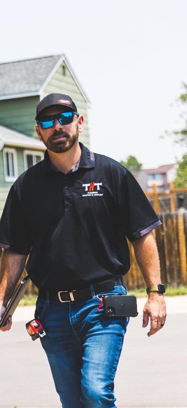 TNT Home Services technician on a job in Longmont, Colorado